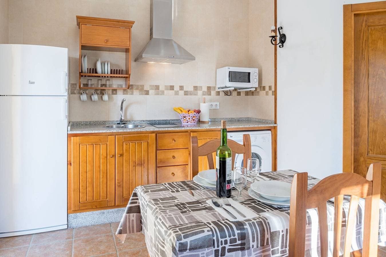 Foto 5 von 24: Klimatisierte Ferienwohnung nahe dem Strand mit Pool, Terrasse, Garten und WLAN
