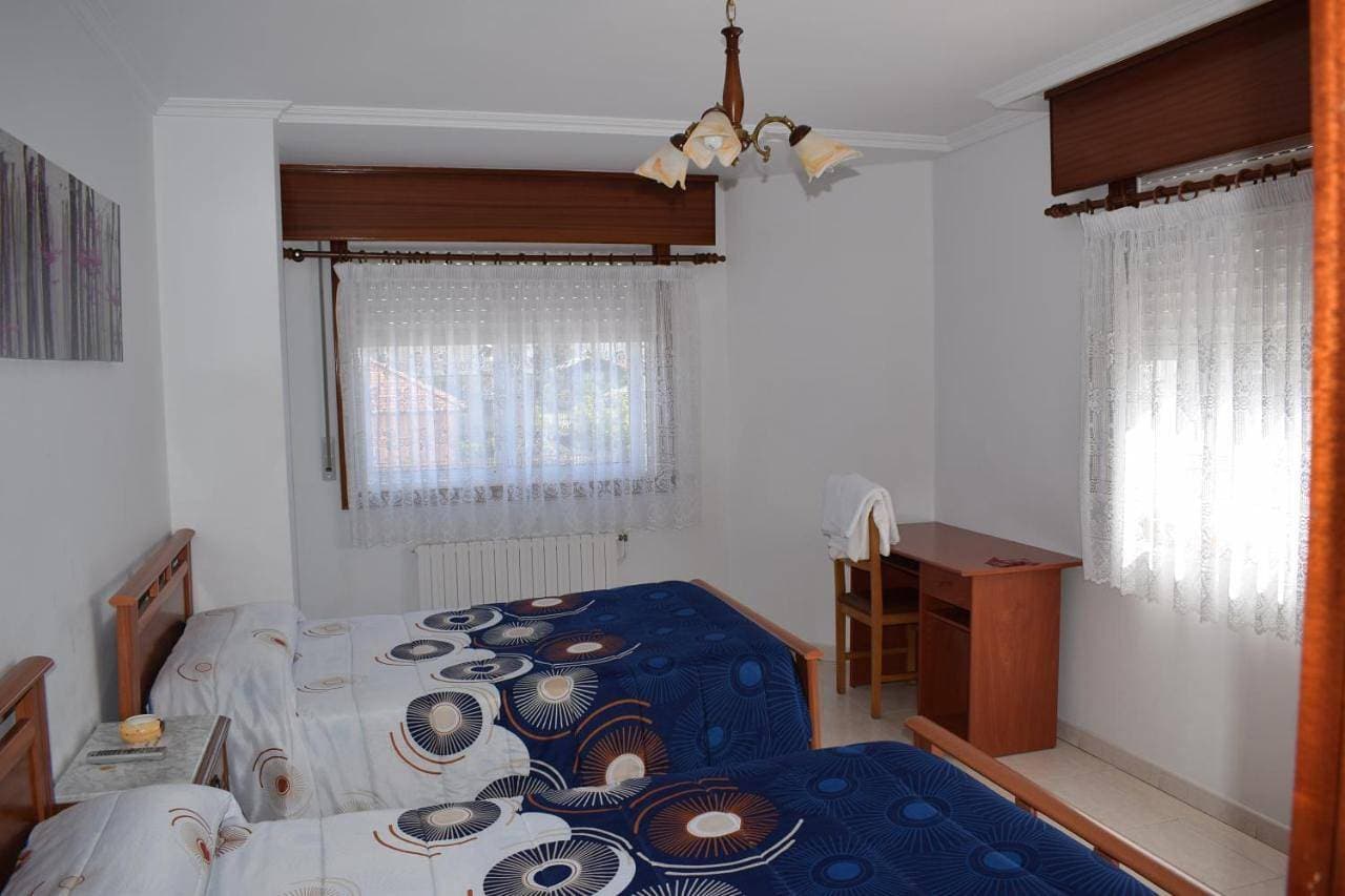 Foto 6 von 9: Standard Twin Room with Shared Bathroom