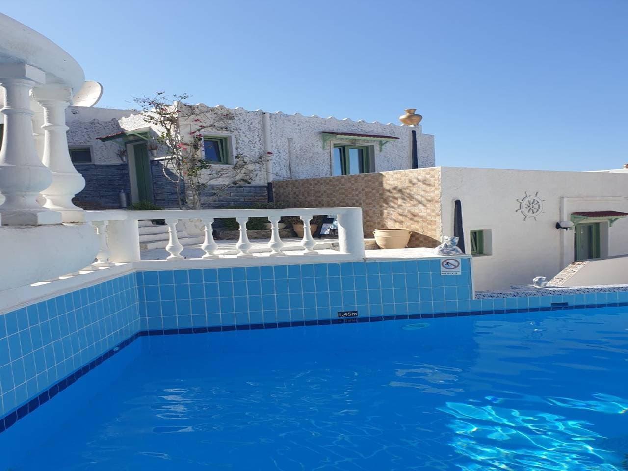 Foto 3 von 10: Treten Sie ein in eine Welt der Natur One Room Private Suite Gemeinschaftspool