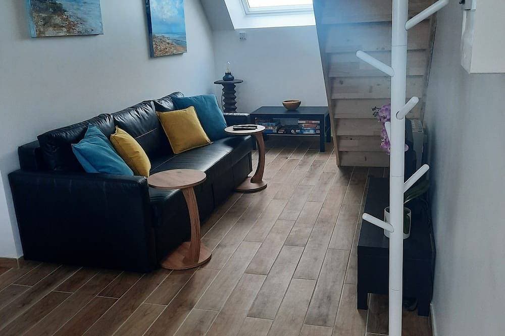 Foto 13 von 30: La Rose des Vents\" duplex apartment with sea view and Arromanches pontoons