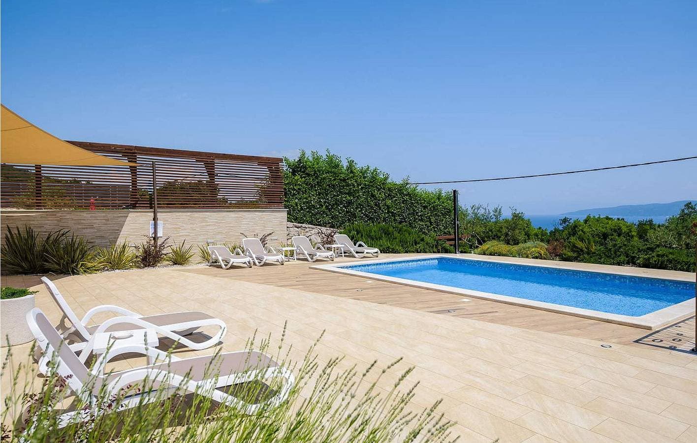 Foto 5 von 39: Charmantes Apartment am Pool mit Terrasse, 1,5 km vom Strand entfernt