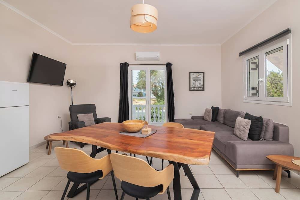 Foto 8 von 30: Tasos Villas - Apartment Nr. 1 - Geräumige Wohnung im Erdgeschoss mit Gartenbereich