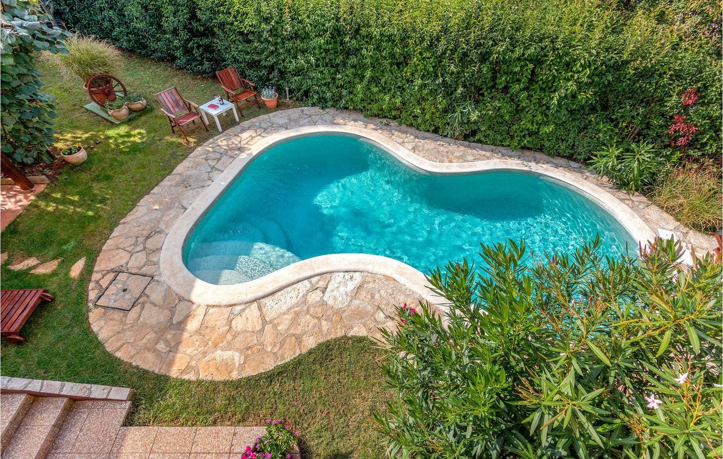 Foto 12 von 35: Charmantes Apartment mit Pool, Terrasse und WLAN – 1,5 km vom Strand entfernt!