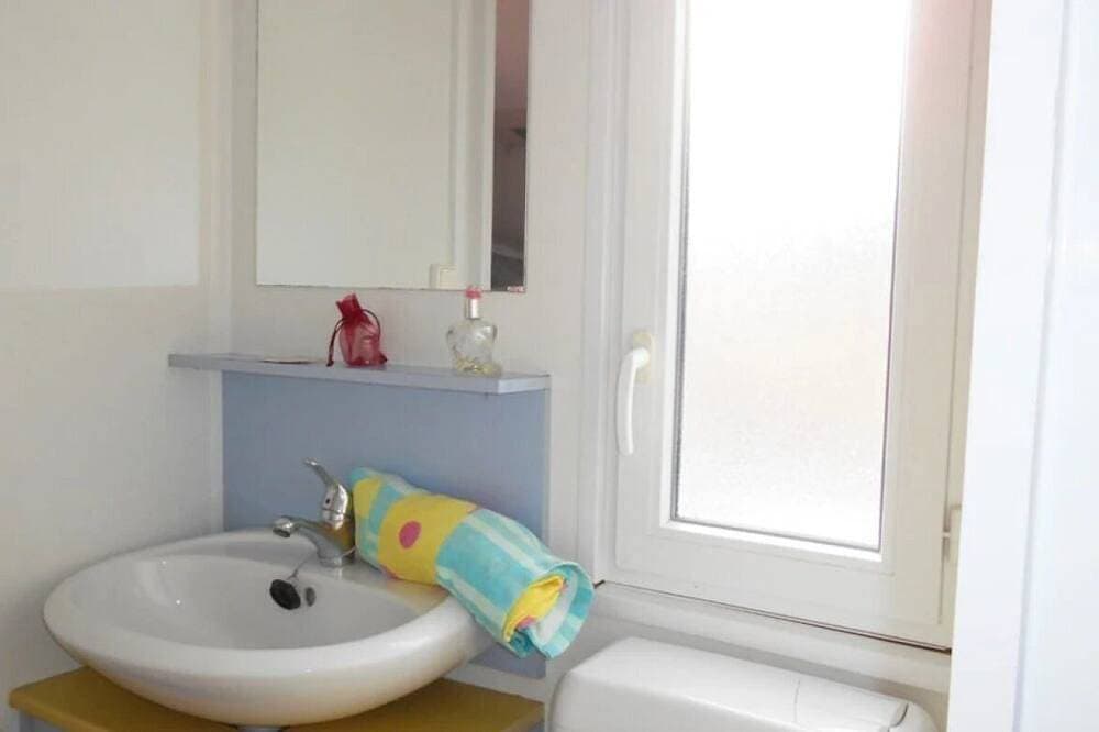 Foto 5 von 17: ZEcamping 3*  club enfant mobil-home TV 17m2 2 pers