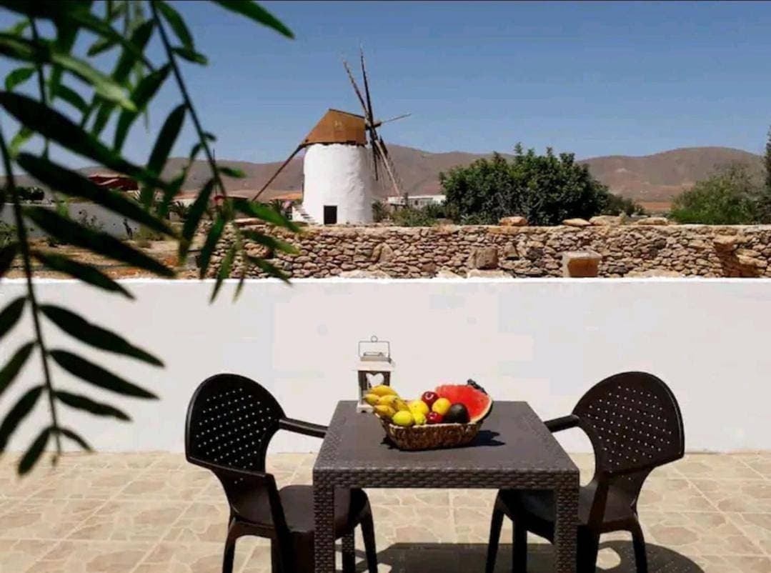 Encantadora casita con molino y piscina 1