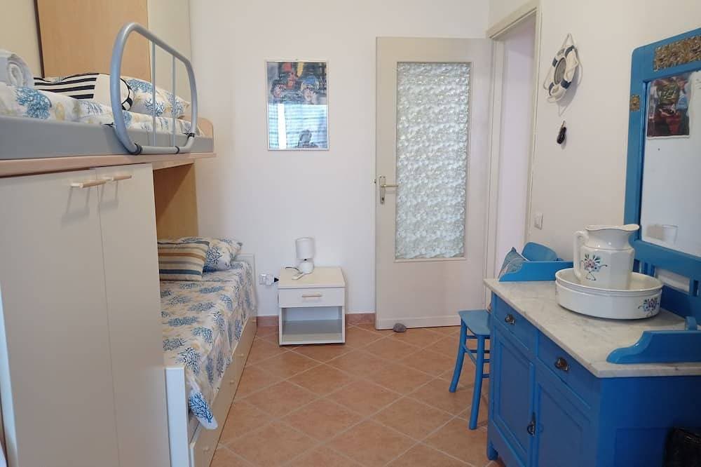 Foto 5 von 25: Village house in quiet street just minutes from the beach under tower