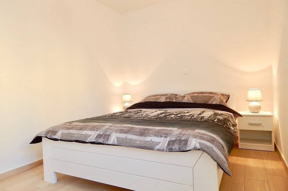 Foto 5 von 25: Comfortable holiday house with apartments / Beautiful first floor apartment with terrace and grill / A3