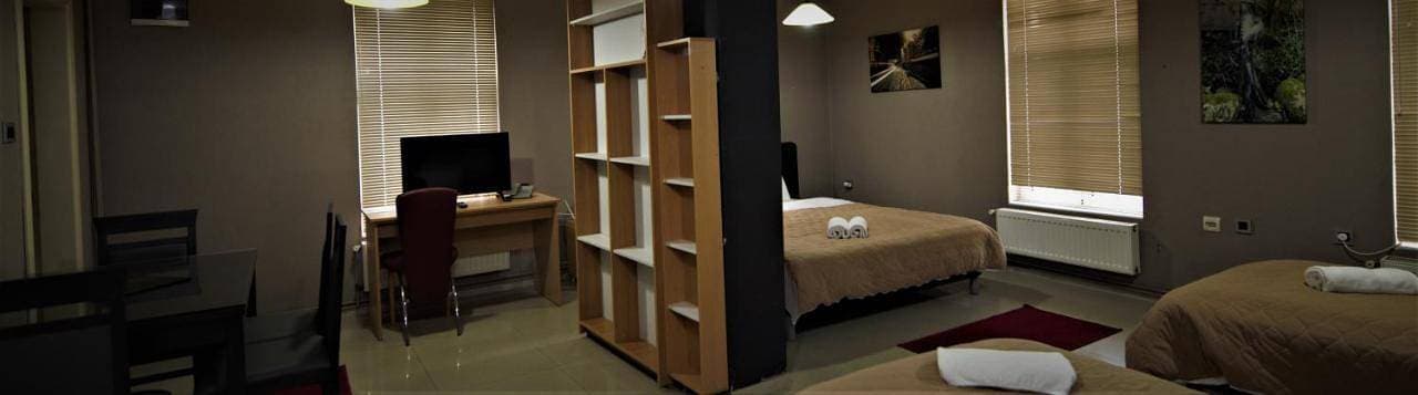Foto 9 von 16: Quadruple Room