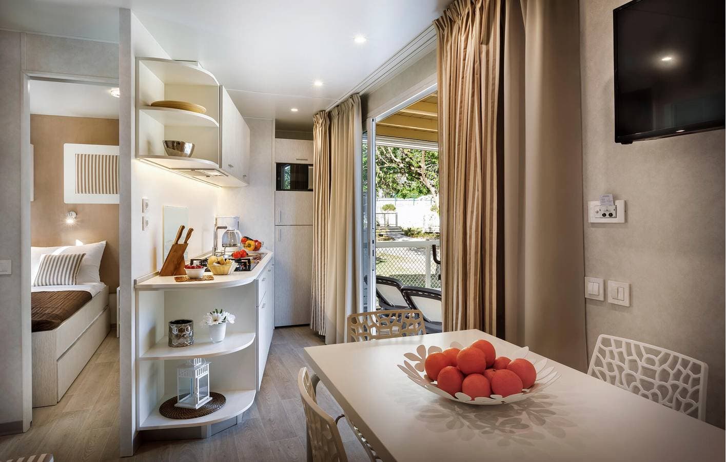 Foto 8 von 28: Gemütliches Mobilheim mit Pool, Terrasse und 1 km zum Strand