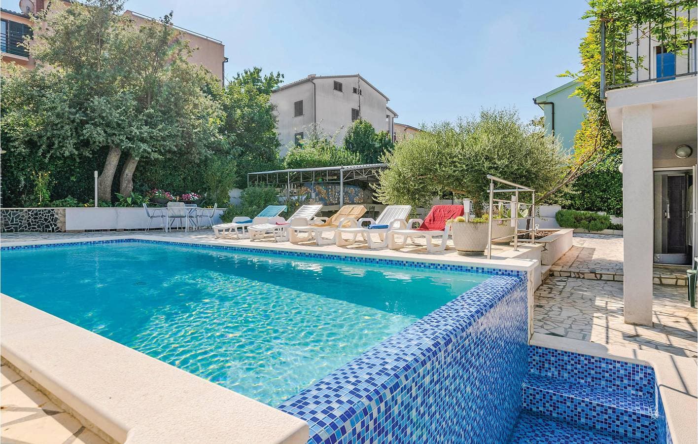 Foto 8 von 28: Gemütliche Ferienwohnung mit Pool, Terrasse und WLAN – nur 1 km vom Strand entfernt!