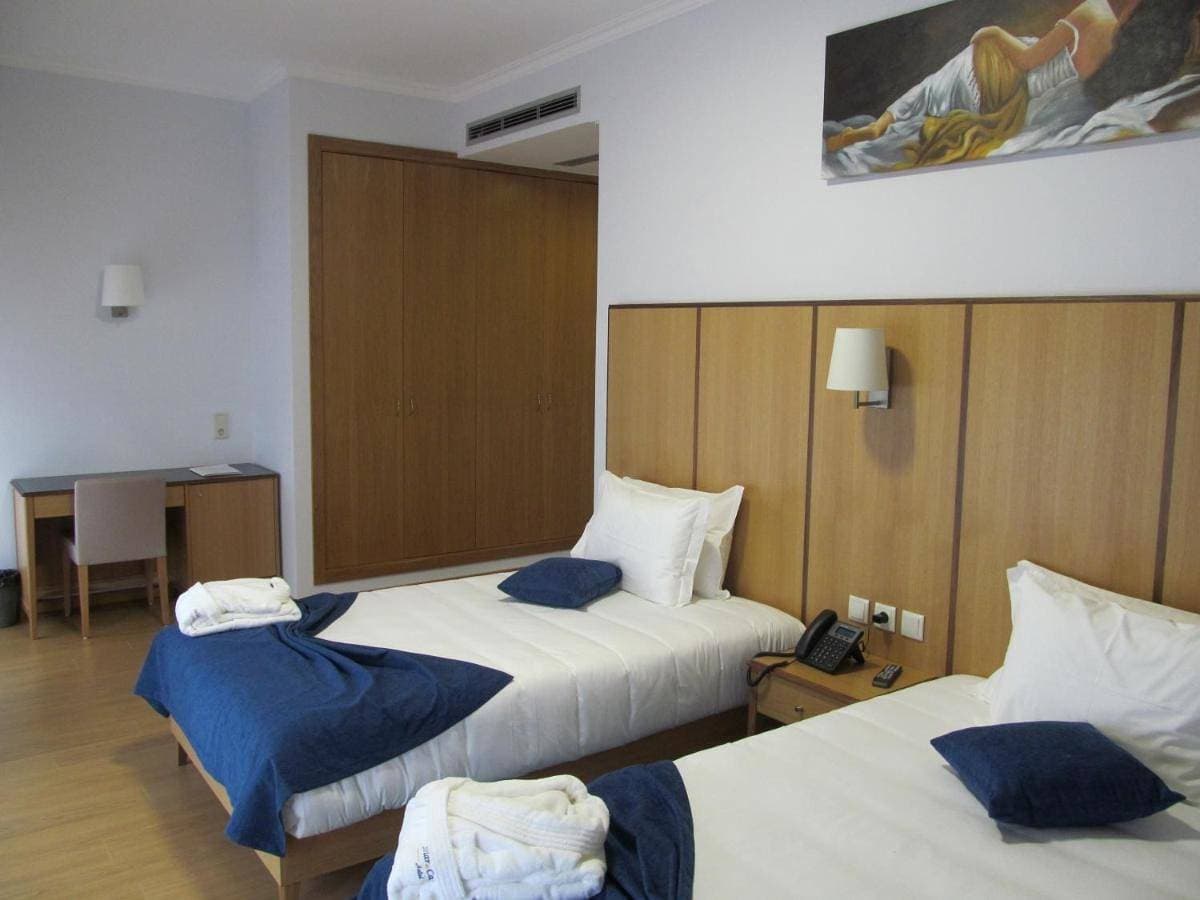 Foto 4 von 9: Triple Room with Balcony