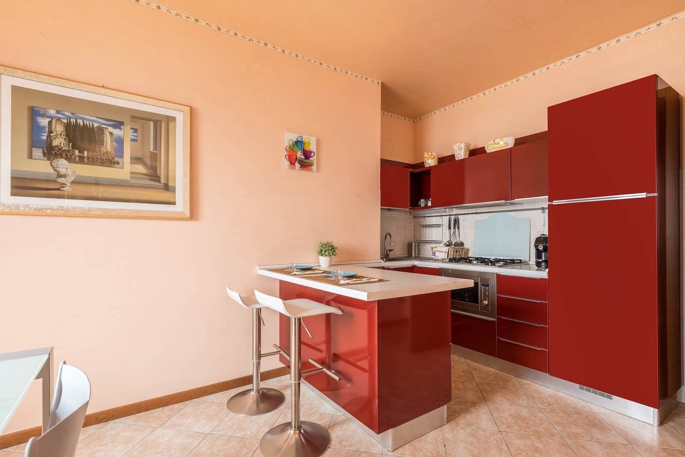 Foto 4 von 31: Ferienwohnung „Luminoso appartamento vista lago“ mit Garten & Seeblick