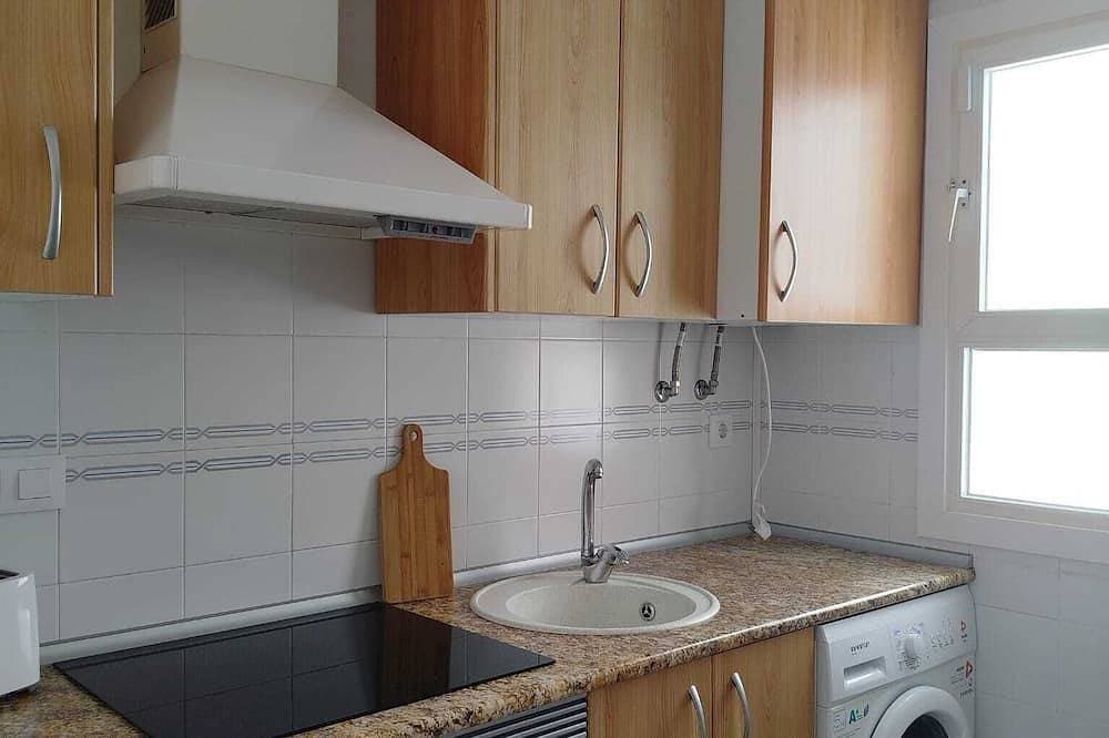 Foto 11 von 17: Cozy apartment near the beach with a private terrace and a shared pool