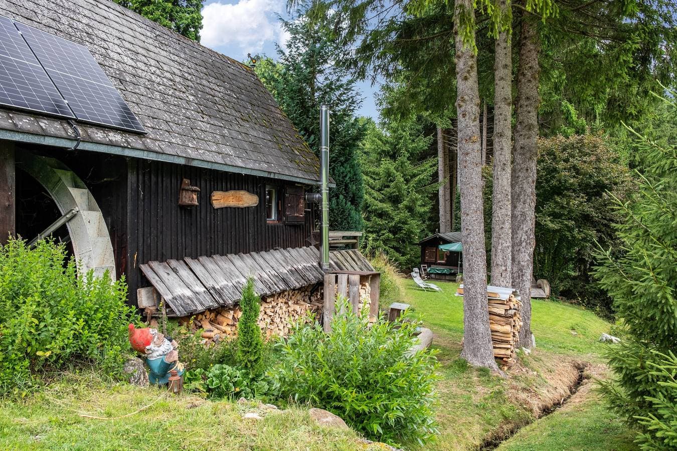 Foto 3 von 36: Ferienhaus 'Mühle-am-Wolfsgrund' mit Bergblick, Privater Terrasse und Privatem Garten