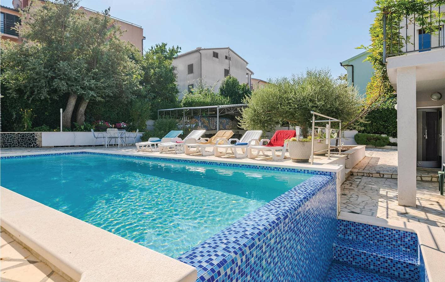 Foto 4 von 30: Gemütliche Ferienwohnung mit Pool, Terrasse und WLAN – nur 1 km vom Strand entfernt!