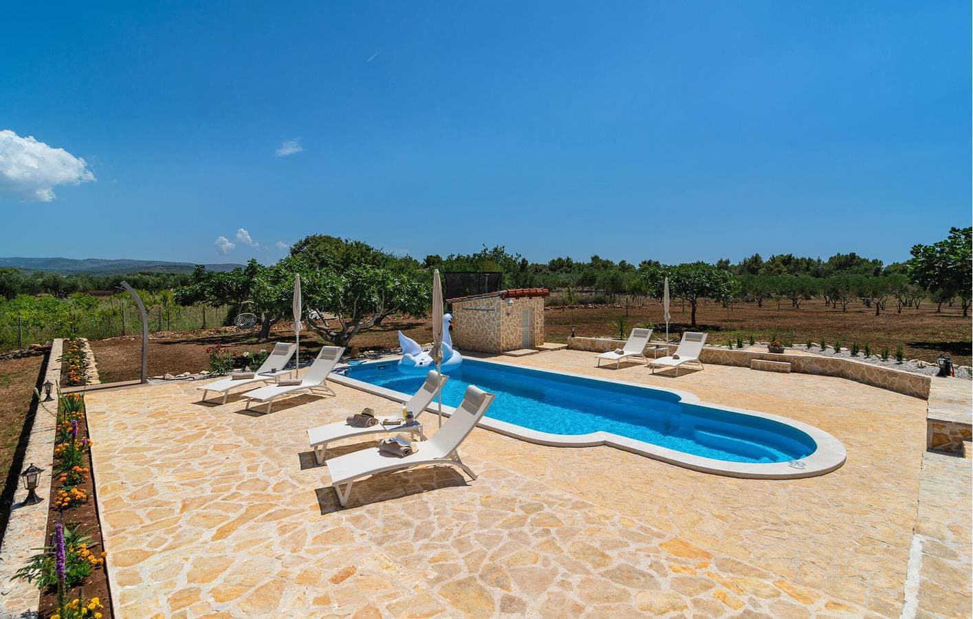 Foto 12 von 30: Gemütliches Apartment mit Meerblick, Pool, Terrasse und WLAN – 1,5 km vom Strand entfernt