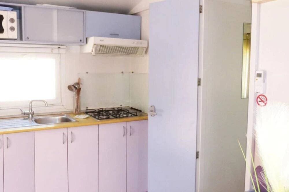 Foto 10 von 17: ZEcamping 3*  club enfant mobil-home TV 17m2 2 pers