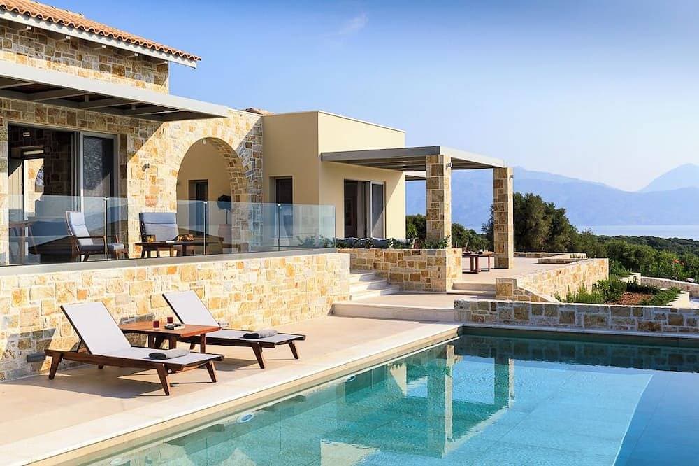 Sea view 2-bedroom villa in lovely Meganis with WiFi, AC 1