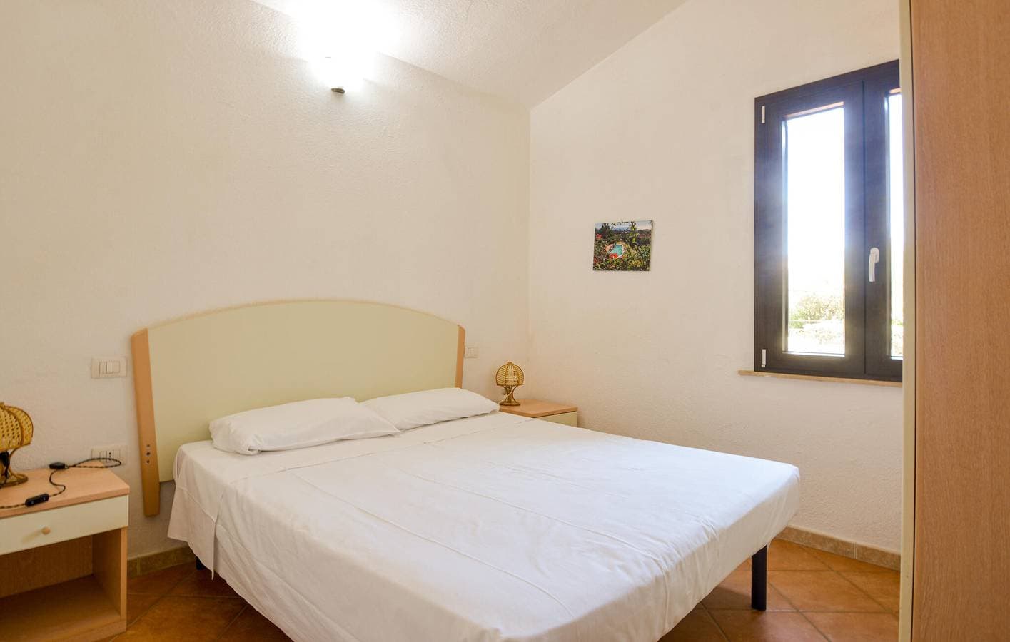 Foto 12 von 15: Appartement mit Meerblick, AC, Parkplatz, Küche und Garten - Nähe Costa Rei Strand