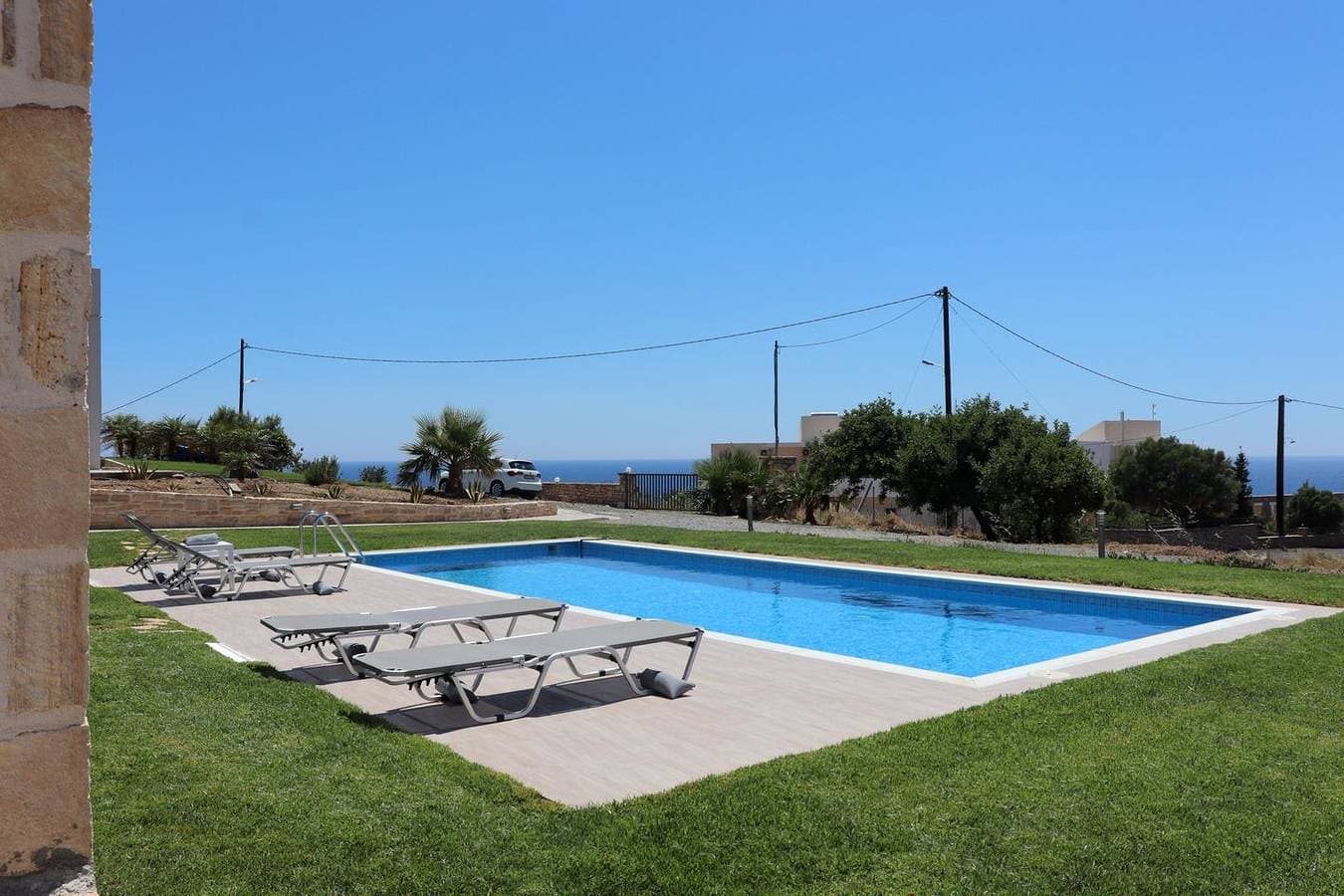 Foto 6 von 41: Weiter Blick auf Landschaft und Meer, Pool, 4 Pers. | Ferienhaus Triopetra, Kreta
