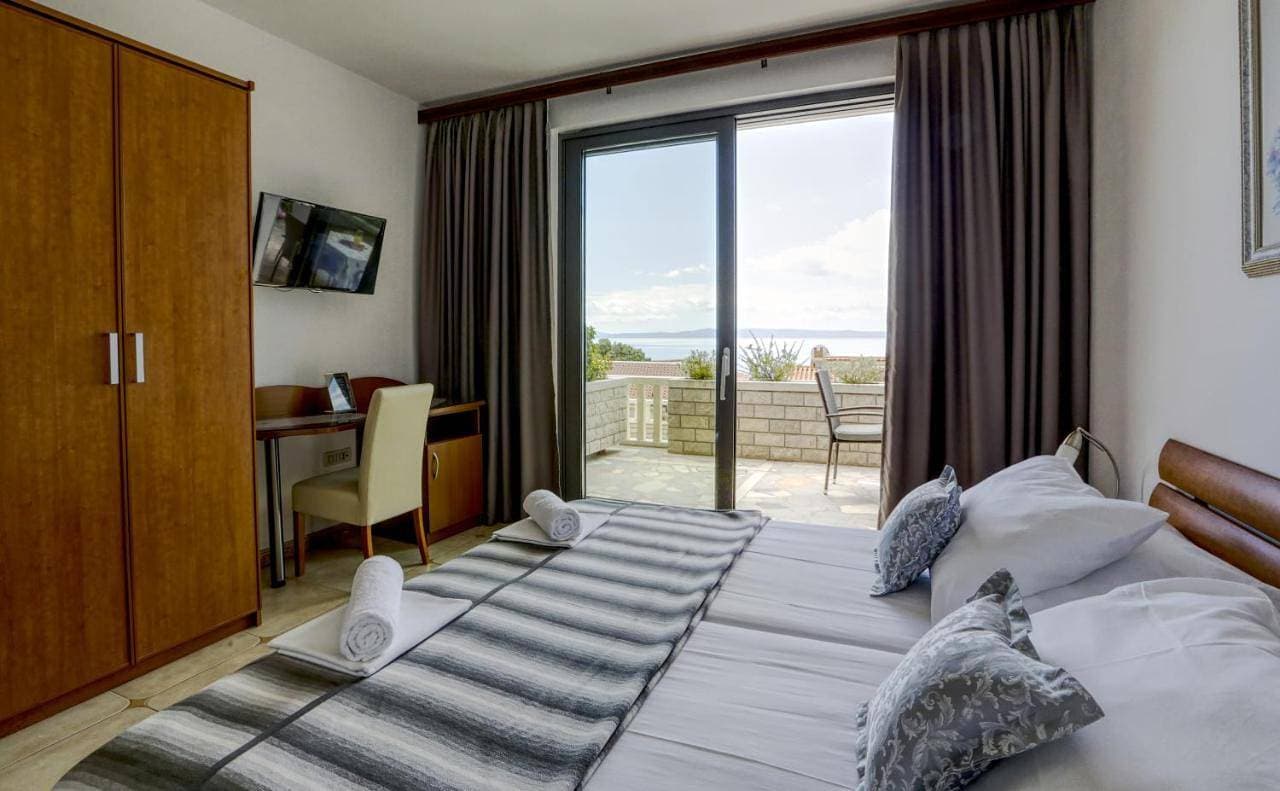 Foto 12 von 16: Two-Bedroom Apartment with Terrace and Sea View