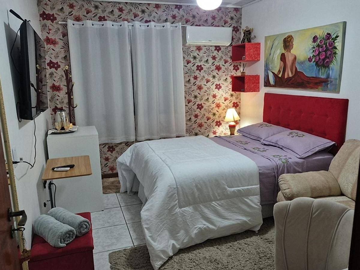Foto 2 von 43: Triple Room with Shared Bathroom - B