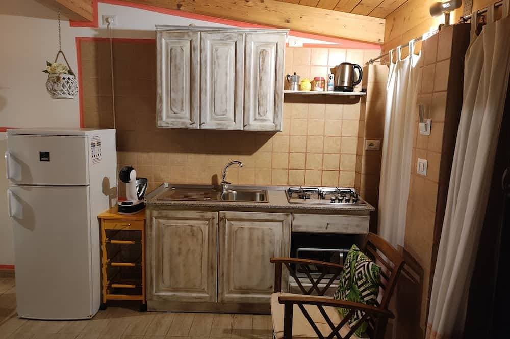 Foto 10 von 11: Hostal De Les Floristes! Floor 0- Four (2+1+1) - garden -Patio- TV