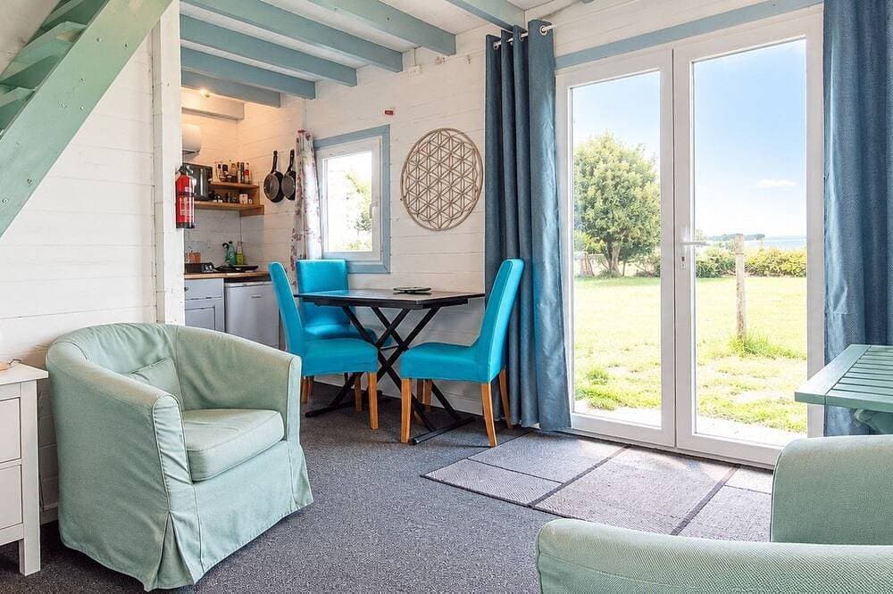 Foto 7 von 18: Cottage du Verger de Pommiers – Idyllisches Naturchalet für 3 Personen