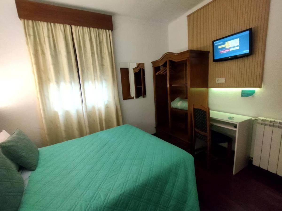 Foto 2 von 10: Economy Double Room