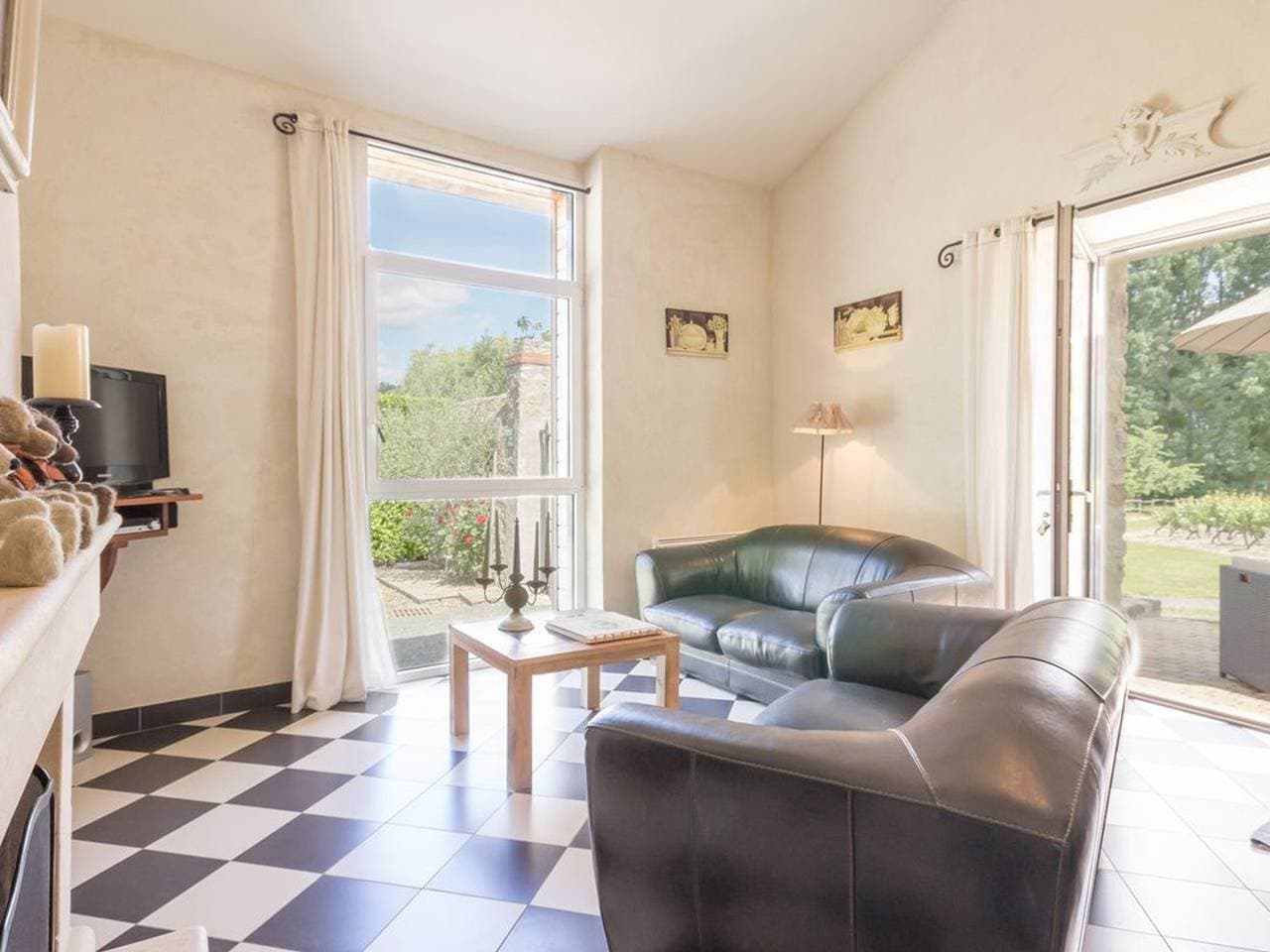 Foto 7 von 16: Charmantes Ferienhaus mit beheiztem Pool und WLAN - 2 Schlafzimmer