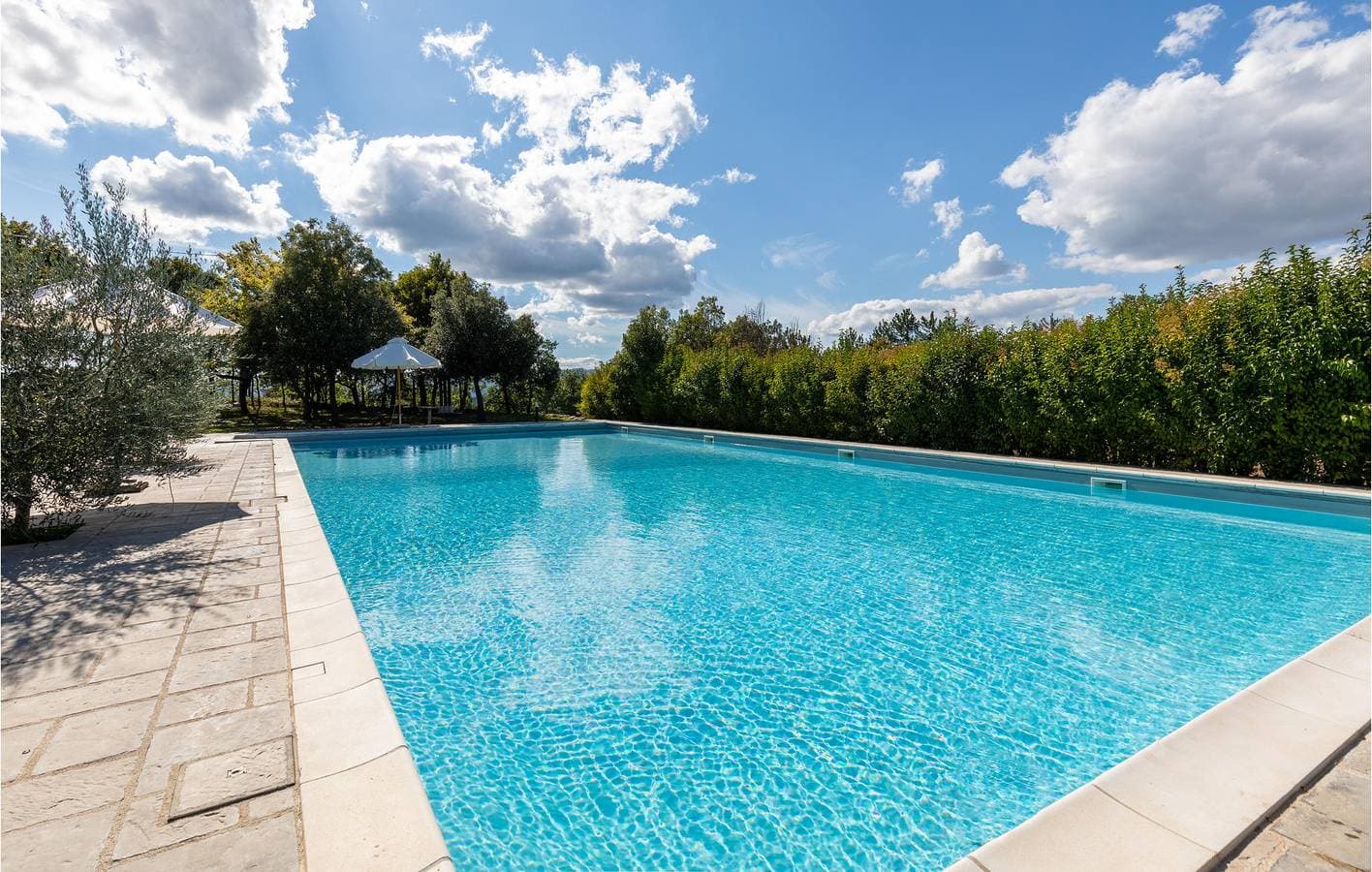 Foto 10 von 31: Appartement in Hanglage mit Babybett, Pool und Parkplatz