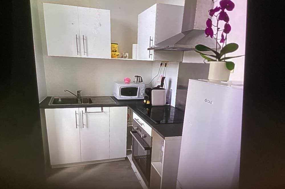 Foto 3 von 7: Apartment in the heart of the village, in a quiet location, with a panoramic view.