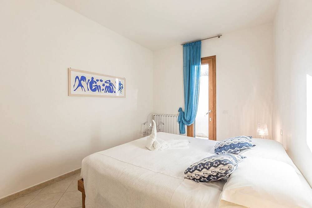 Foto 6 von 30: Villa Napius - Zugang zum privaten Strand an einem Sandstrand