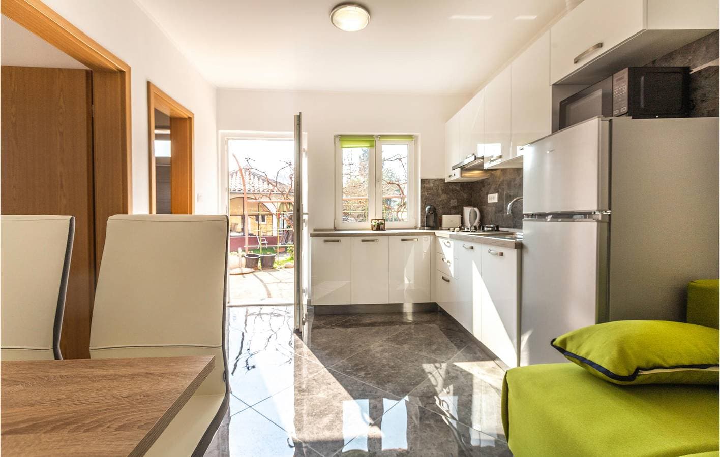 Foto 5 von 17: Ferienwohnung für 4 Personen mit Garten