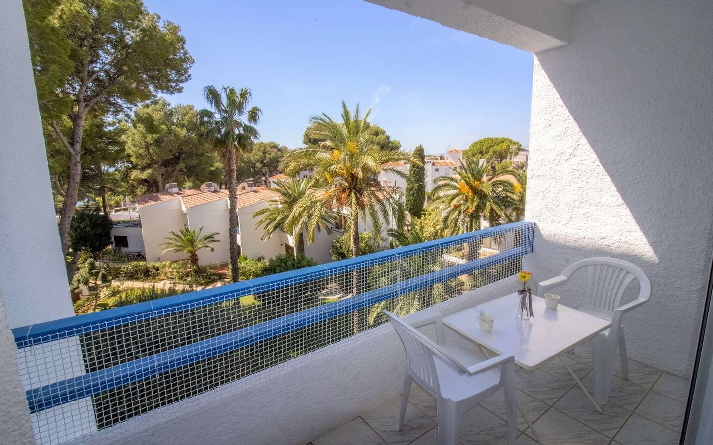 Foto 5 von 17: Las Fuentes Beach Studio - Piscina y jardín