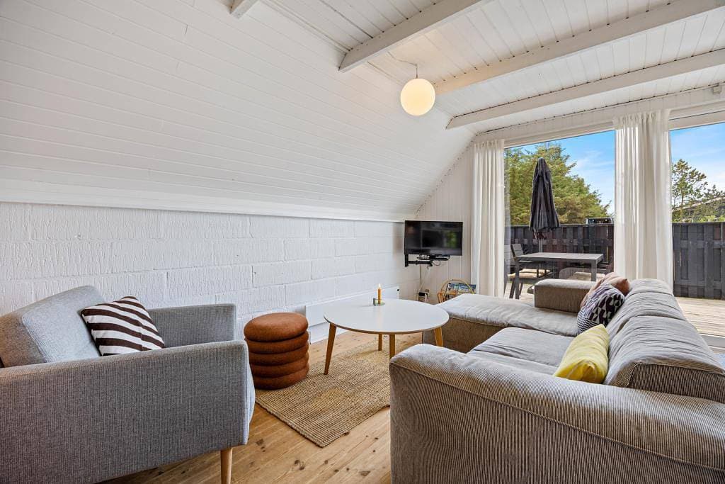 Foto 5 von 28: Ferienhaus geschlossener Terrasse und einem Gartenpavillion