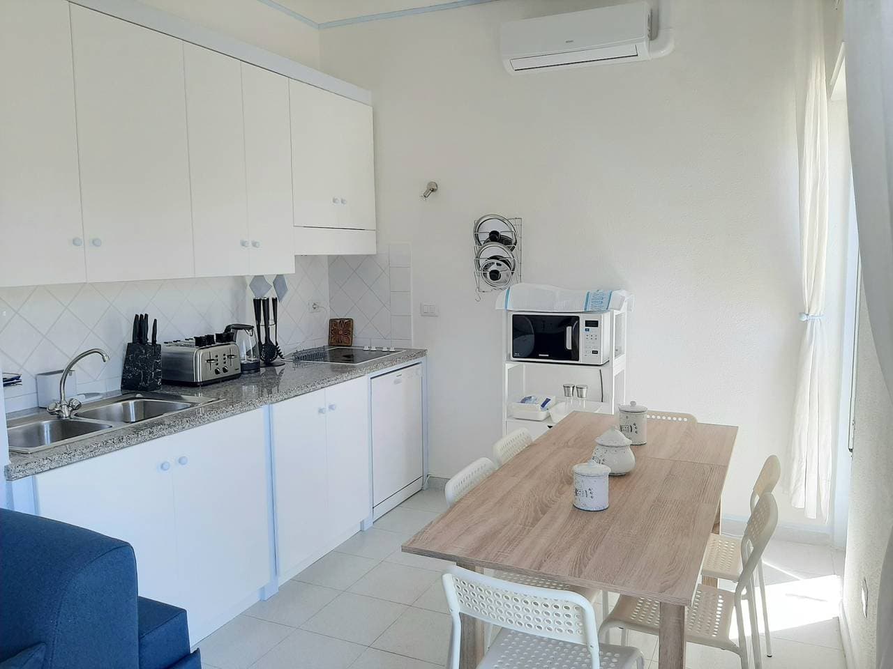 Foto 11 von 23: Ferienwohnung für 6 Personen mit Garten