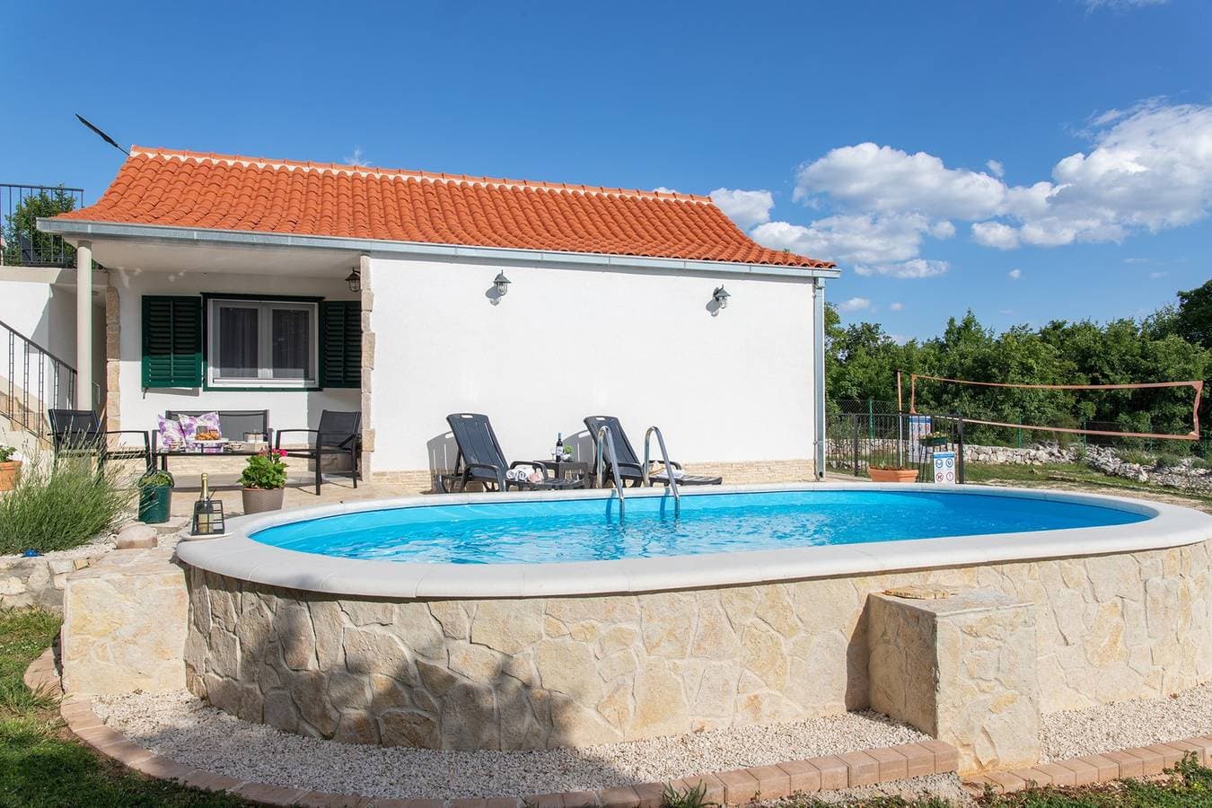 Foto 5 von 29: Ferienhaus mit zwei Schlafzimmern und Pool
