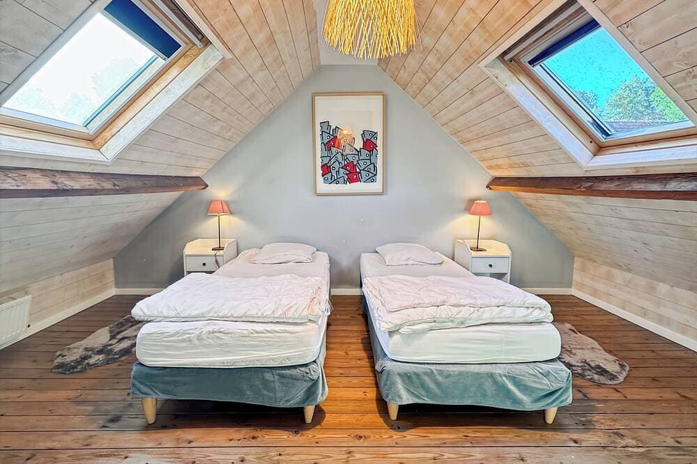Foto 5 von 30: Charmantes Ferienhaus mit Blick auf die Bucht und Garten