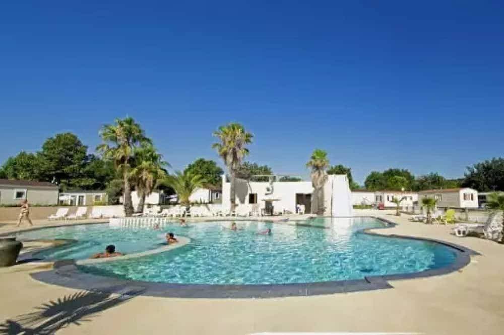 Foto 13 von 14: ZEcamping 4 étoiles piscine extérieur locatif TV Lv clim 20m2 2 pers