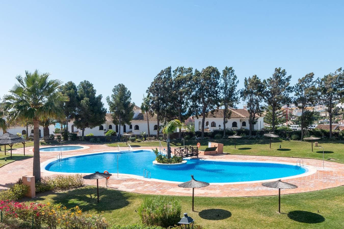 Foto 4 von 28: Ferienwohnung 'Duquesa Suites Golf und Gärten' mit Pool zur gemeinsamen Nutzung und Klimaanlage