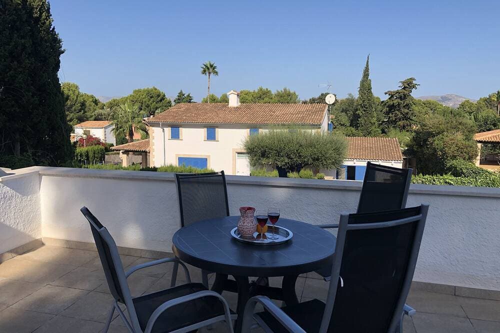 Foto 12 von 29: Ruhig gelegenes 4-Personen Ferienhaus mit Garten, Dachterrasse mit Meerblick