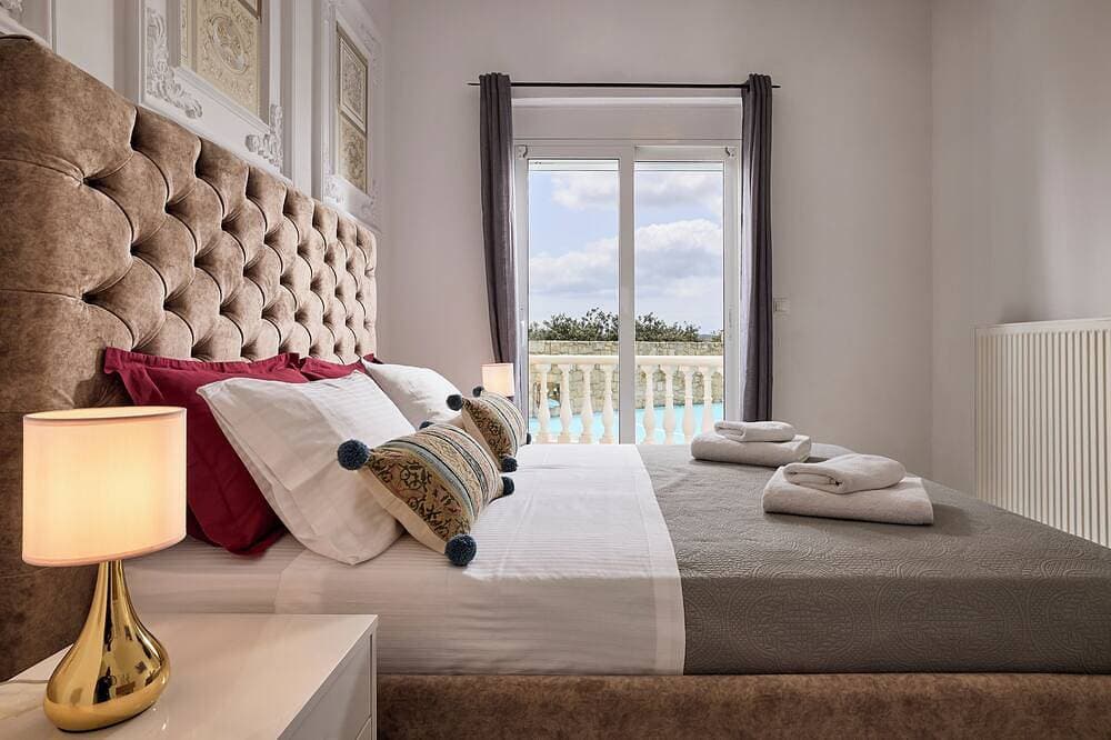 Foto 5 von 30: Luxury White House - Family Villa Near Sea - Zorbas Beach with playground, bikes