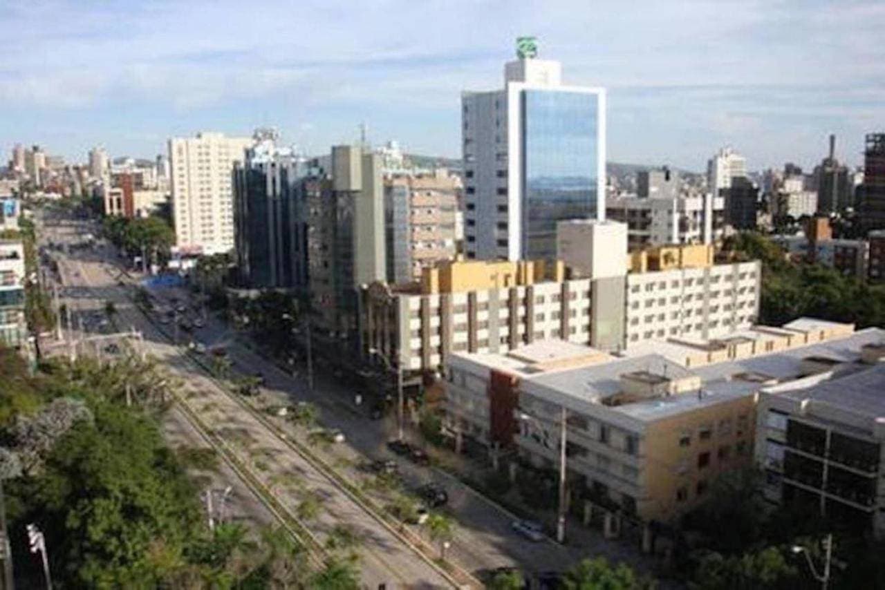 Foto 10 von 18: Suítes e Quartos na Avenida Carlos Gomes