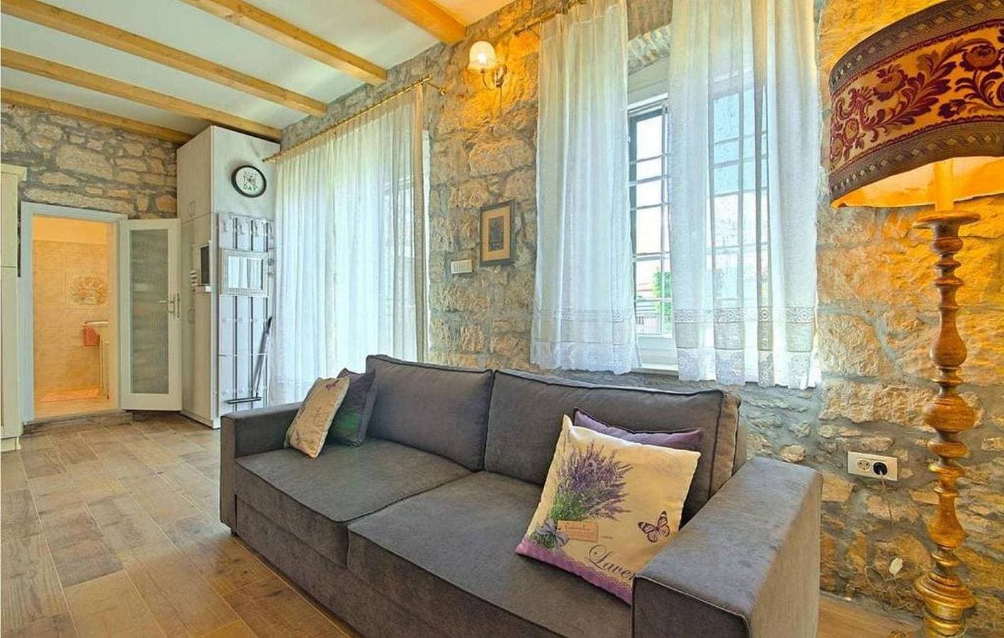 Foto 11 von 38: Rustikales Steinhaus nur 300 Meter zum Strand mit Meerblick, Grill, Terrasse