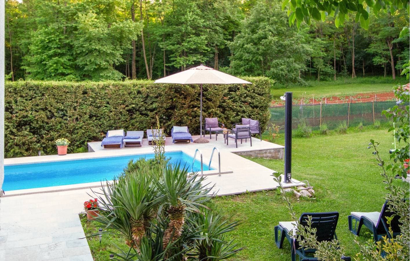 Foto 11 von 39: Geräumige 2-Zimmer-Wohnung mit Pool, WLAN, Klimaanlage und Parkplatz – Ihr idealer Rückzugsort!
