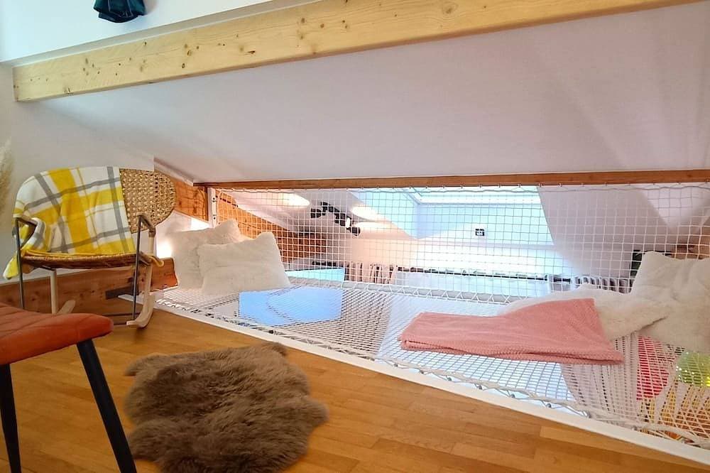Foto 4 von 27: Cosy apartment with whirlpool bath in bedroom and catamaran net