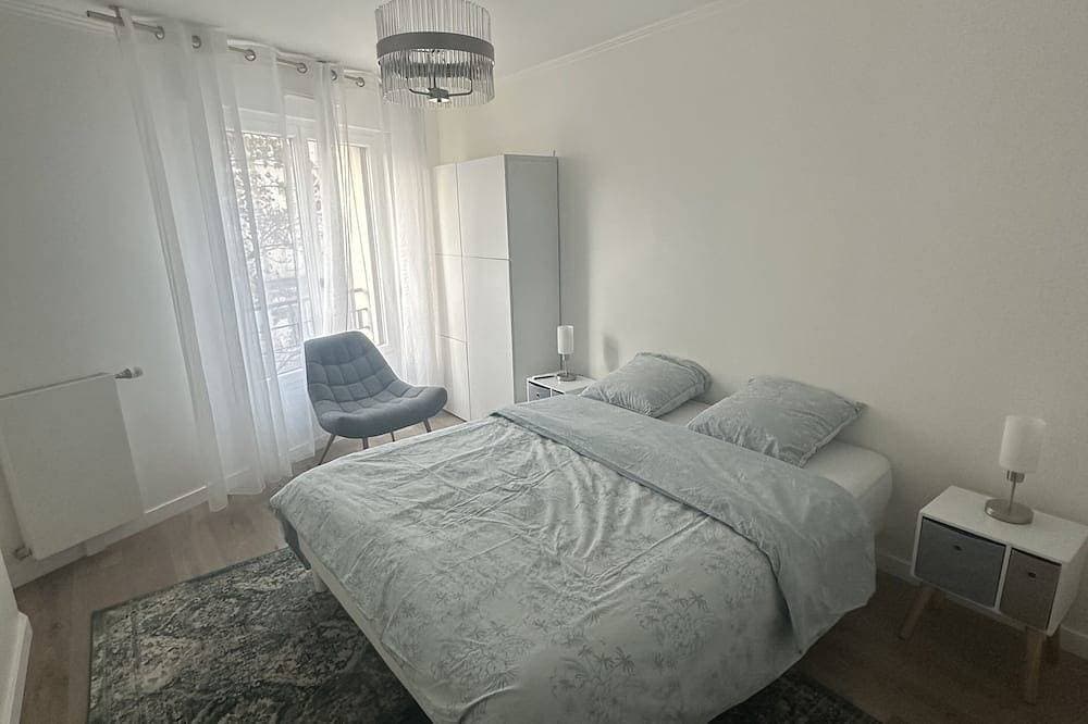 Foto 2 von 12: Appartement Idéal Pour les Familles, Proche de Paris et des Futurs Jo !