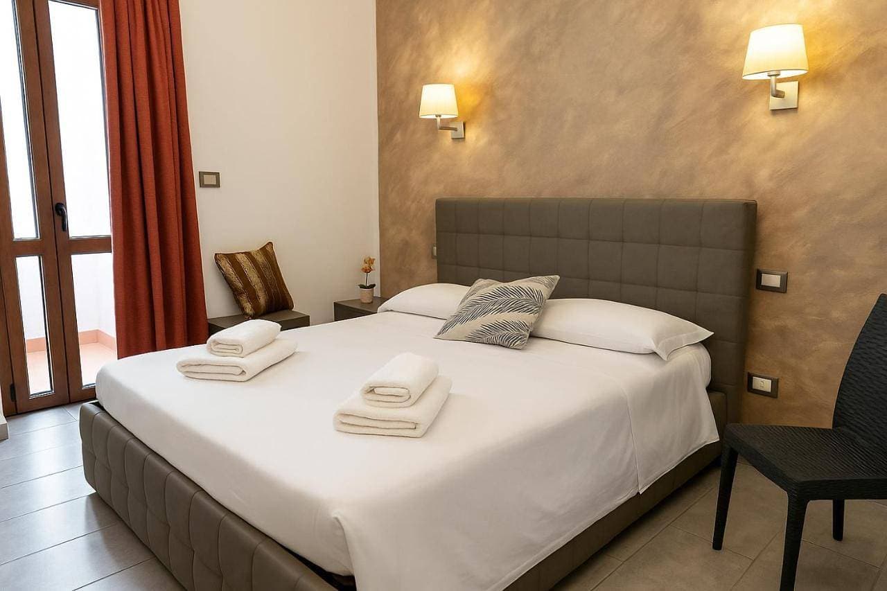 Foto 2 von 10: Double Room with Private Bathroom