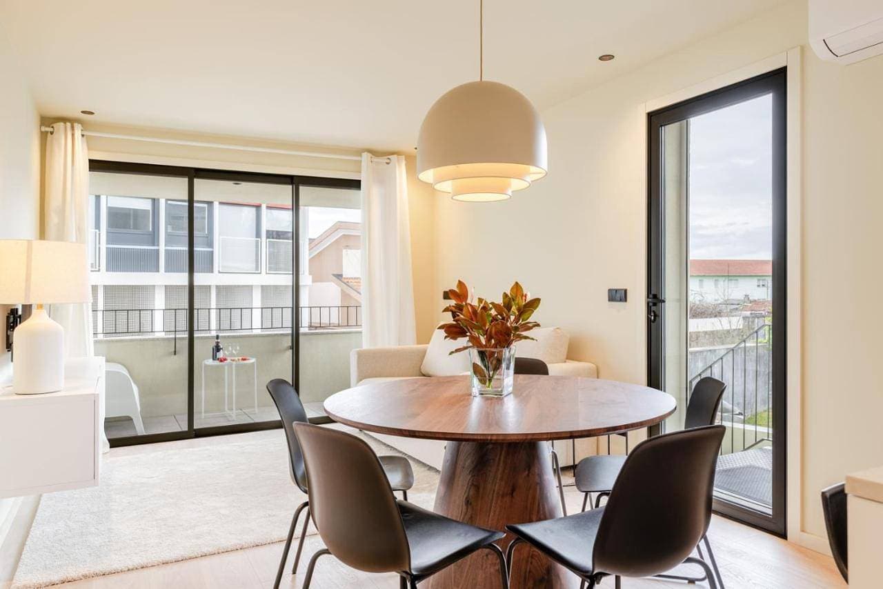 HostWise - Stylish Flat with Terrace & Garage 1